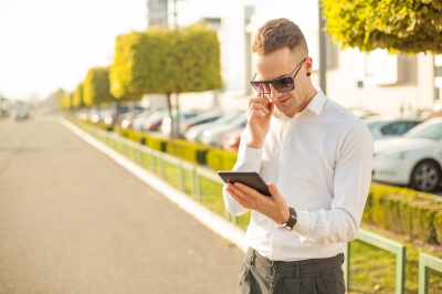 Person using tablet while on a call