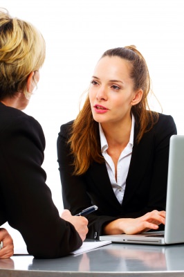 Girl taking advice from her mentor