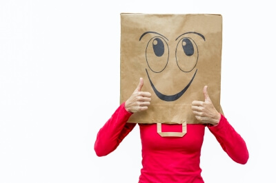 Happy woman with thumbs up