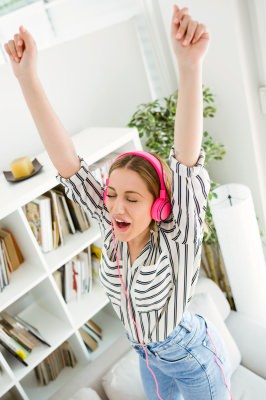 Woman listening music at home