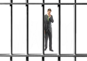 Sad-Businessman-in-prison